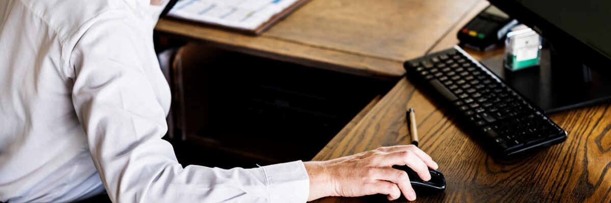Female resort receptionist on the phone